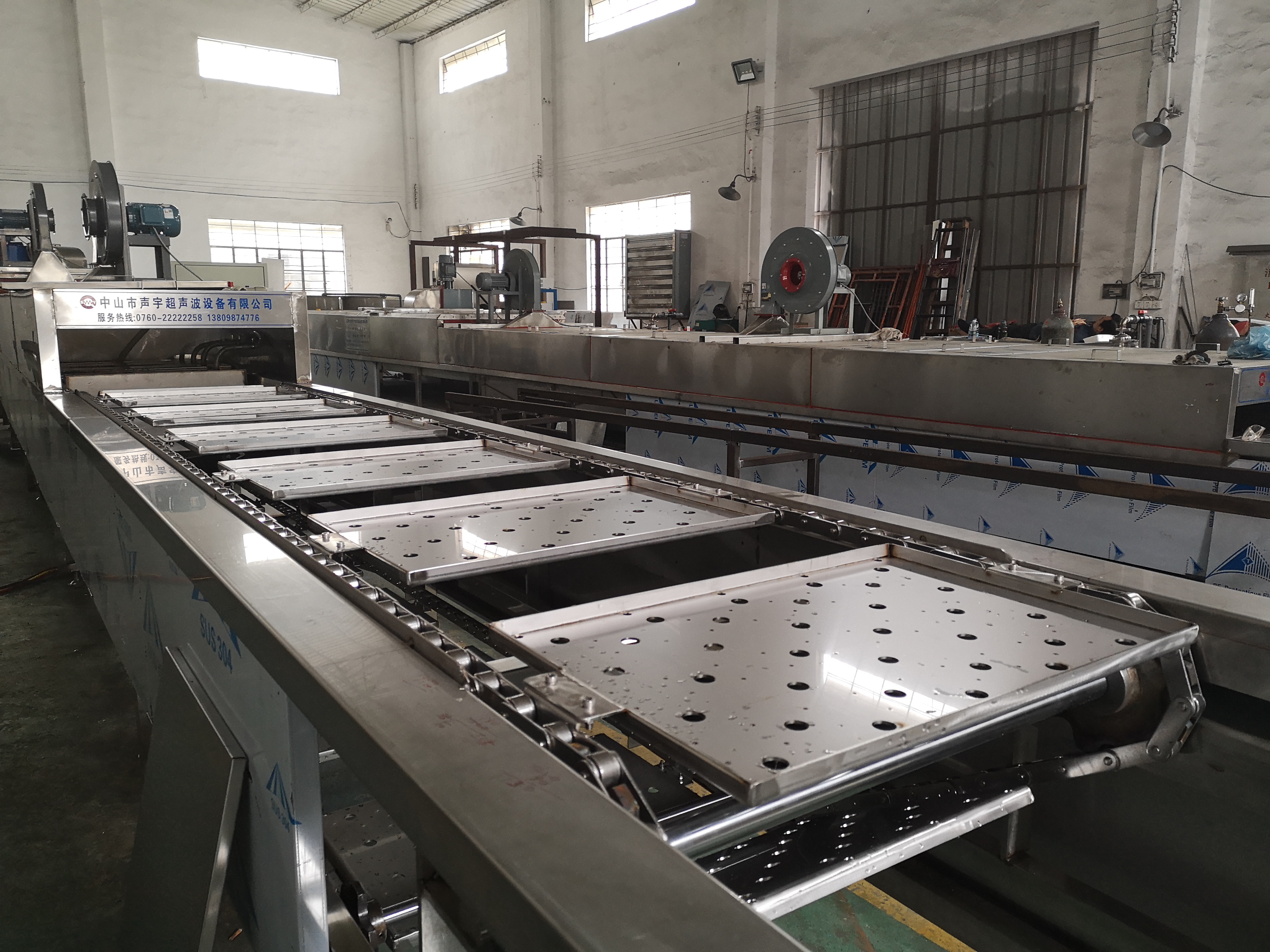 美的機器人閥芯清洗線大型超聲波清洗機設(shè)備